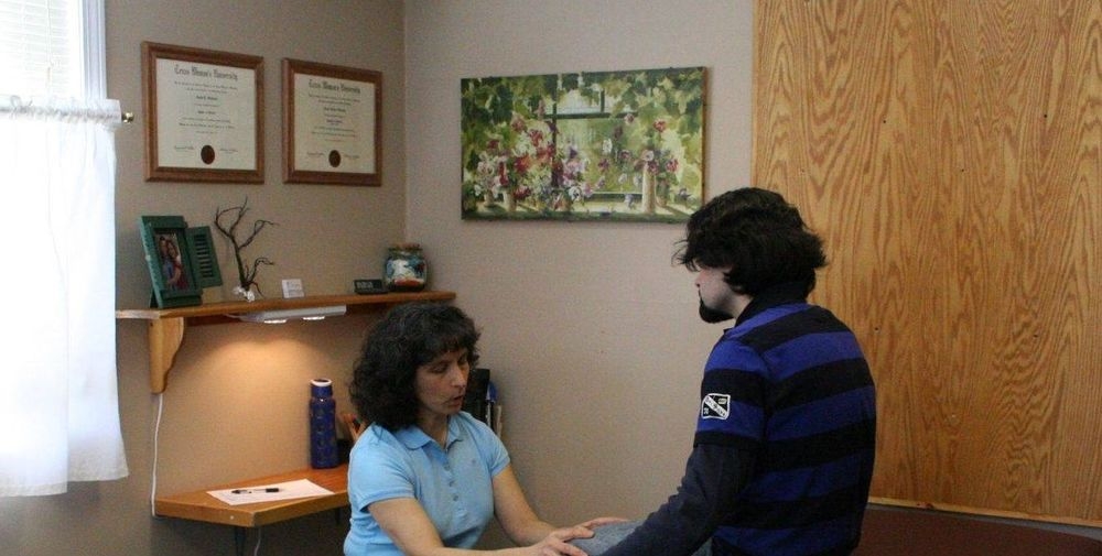 Physical Therapist in New Hampshire performing an assessment